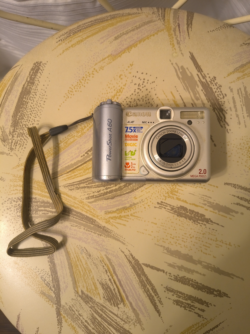 Canon Silver Digital Camera with Wrist Strap For Parts Only